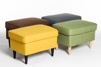 Fuga-rahin värivaihtoehdot Neljä eri väristä Fuga-rahia studiokuvassa