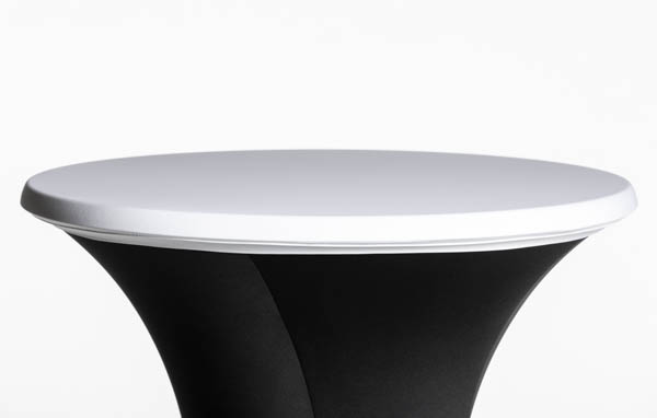 Pöydän kangashuppu jossa valkoinen yläosa ja musta runko-osa