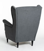 Harmaa nojatuoli Fuga takaviistosta