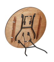 Pyöreän 120cm Dine-pöydän taittojalat. Jalat täytyy taittaa kuljetusasentoon oikeassa järjestyksessä. Pyöreän taittojalkaisen 120cm Dine-pöydän alapuoli ja taittojalkamekanismi